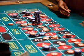 Caribbean Stud Poker live dealer table on rupiahtoto resmi showing five community cards